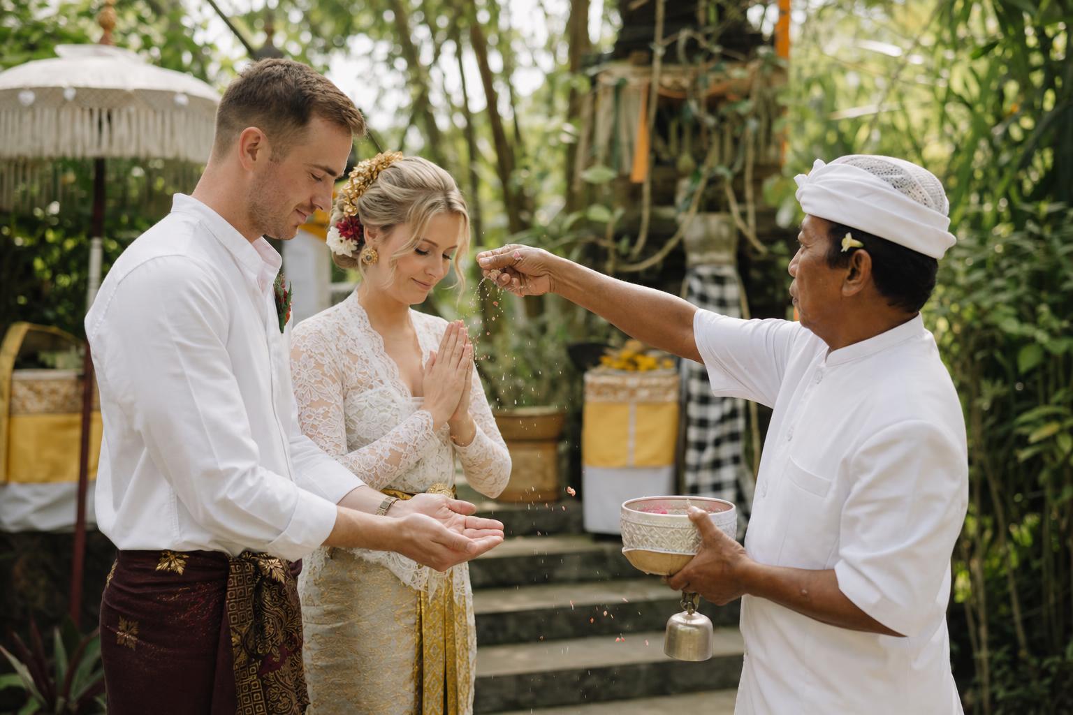 Balinese temple offering by the sea