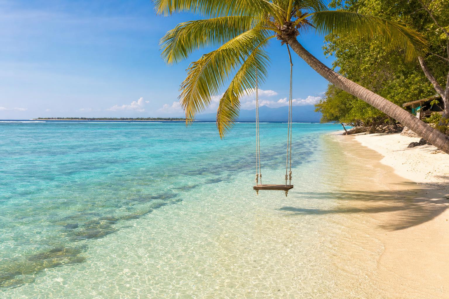 Turquoise-water island beach wedding on the Gili Islands