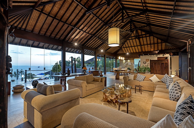 The pool and open living pavilion at Villa Aamisha with the sea beyond