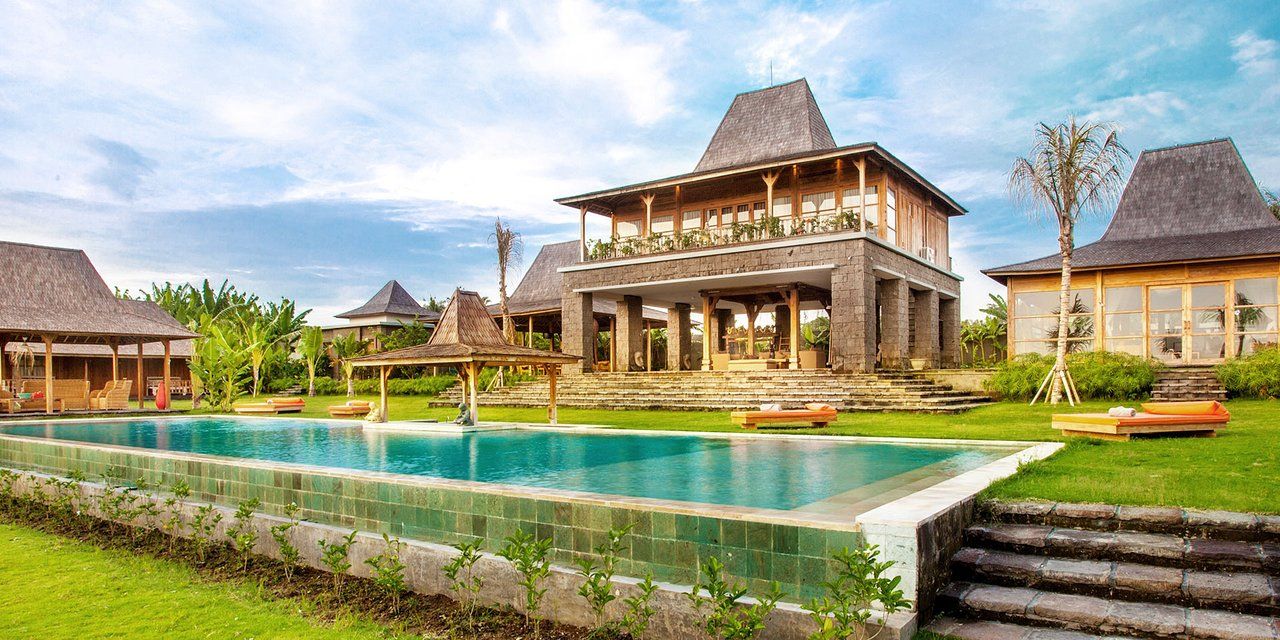 Alami Boutique Villas & Resort lawns and pavilions above the ocean and rice terraces in Selemadeg Timur, Tabanan