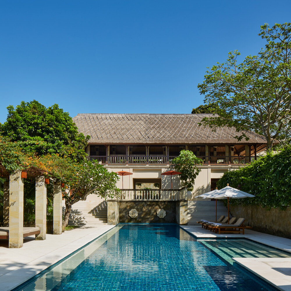 Private pool villa with thatched pavilion and tropical gardens at Aman Villas at Nusa Dua, Bali