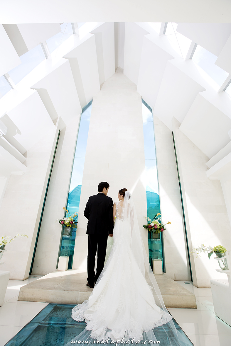 Interior of Amanda Chapel looking down the glass aisle to the tall glazed altar wall