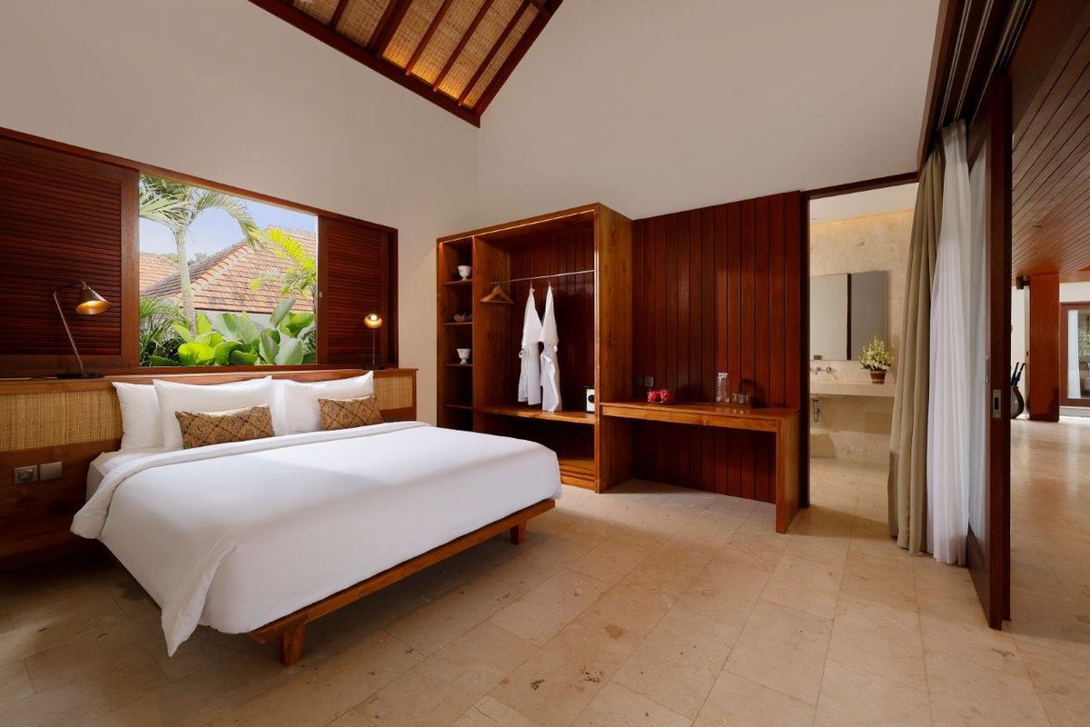 Beachfront lawn and ocean at Amarta Beach Retreat, Pasut Beach, Tabanan