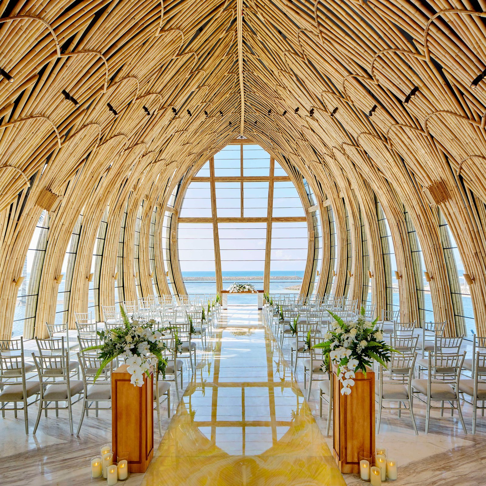 The tiered amphitheatre architecture of The Apurva Kempinski Bali descending toward the ocean in Nusa Dua