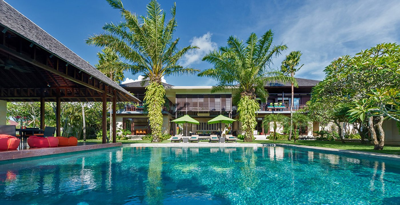 The pool and open pavilions of Bendega Nui, the main villa at Bendega Villas in Canggu