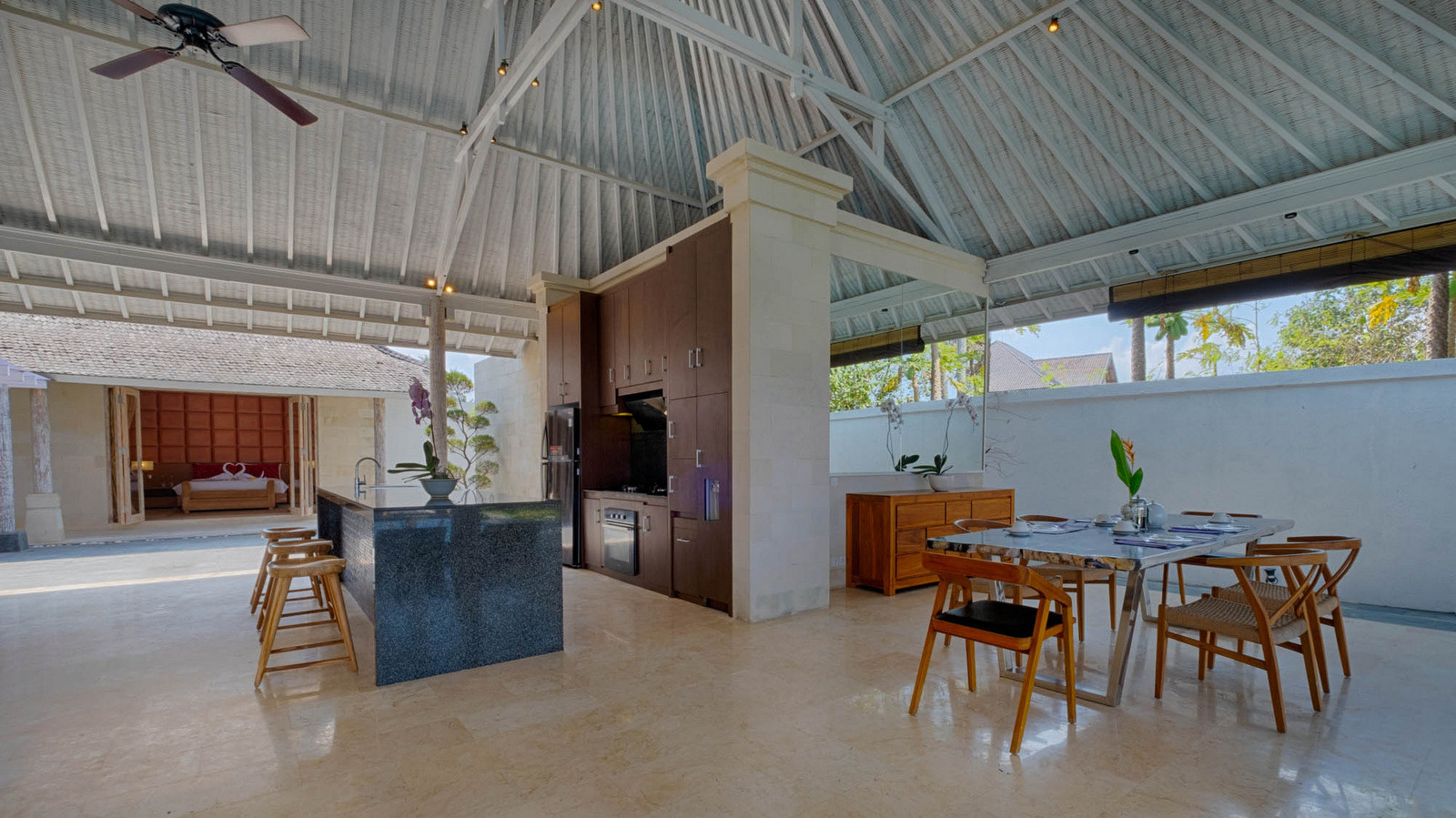Modern kitchen and open living space at Biara Villa with high ceilings and natural light