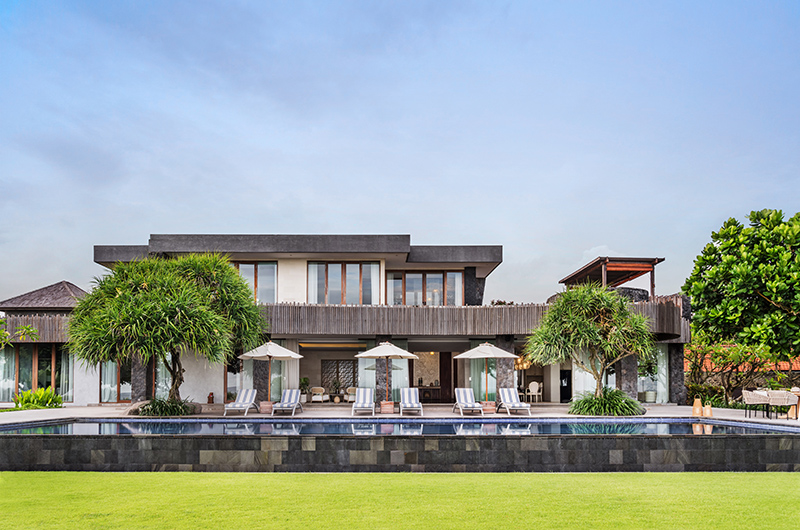 Beachfront garden and pool at Candani Villa facing the Indian Ocean in Ketewel, Gianyar