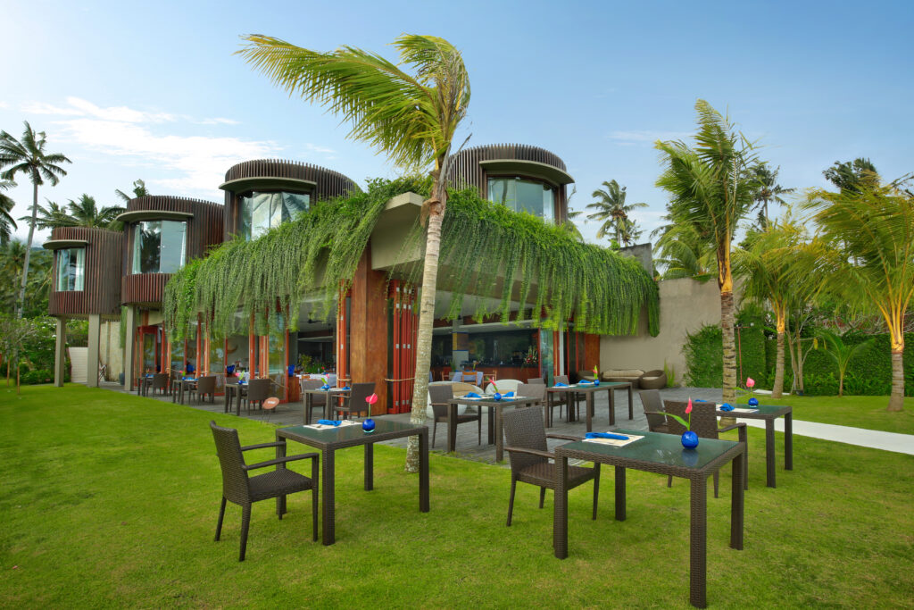 Basil Restaurant at Candi Beach Resort, open-air dining venue with sea views and architectural design