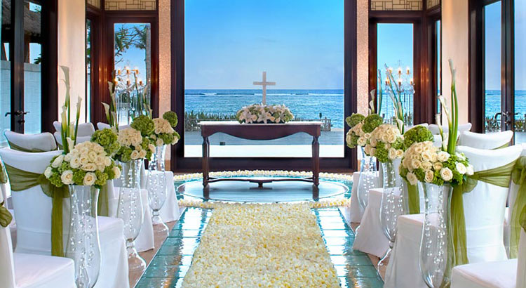 Interior of Cloud Nine Chapel with a petal aisle, altar cross and Indian Ocean view, The St. Regis Bali Resort, Nusa Dua