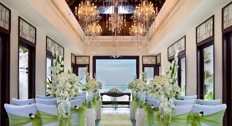 Cloud Nine Chapel interior dressed with white lilies and a Swarovski chandelier, The St. Regis Bali Resort, Nusa Dua