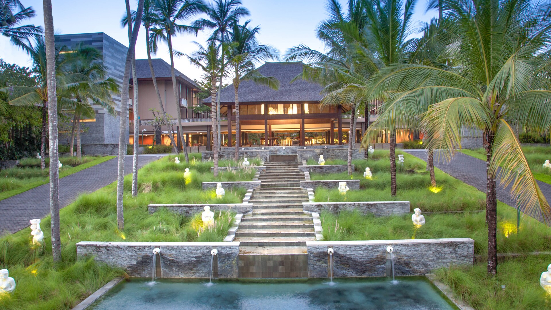 Exterior and pool area of Courtyard by Marriott Bali Nusa Dua Resort