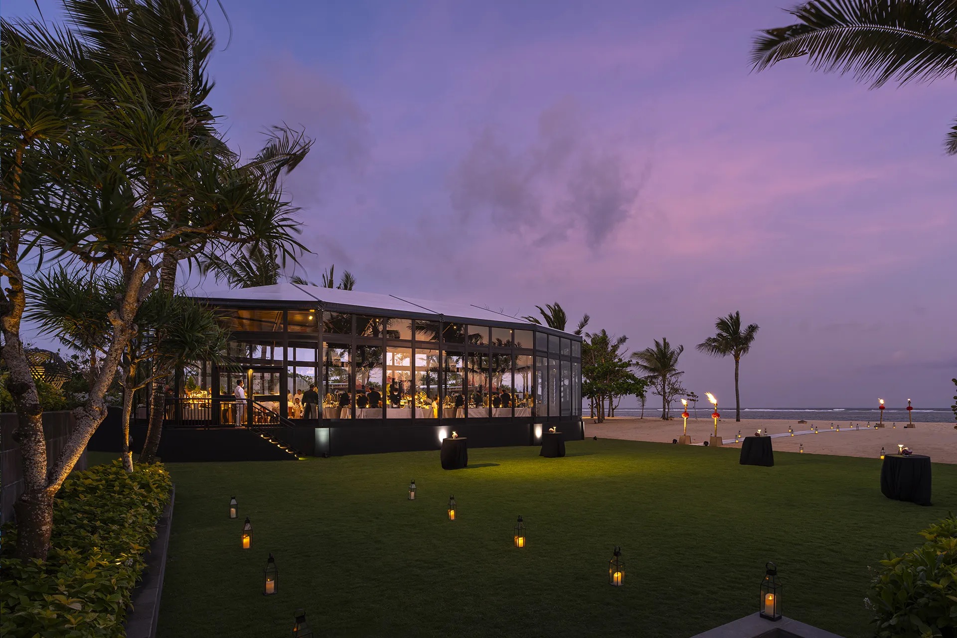 The Mulia Glass House, a floor-to-ceiling glass wedding pavilion on the Nusa Dua beachfront overlooking the Indian Ocean