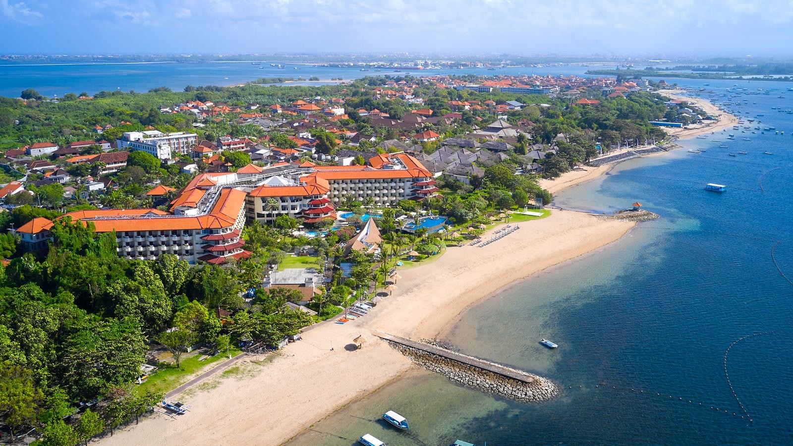 The beachfront and pools of Grand Mirage Resort & Thalasso Bali in Tanjung Benoa, Bali