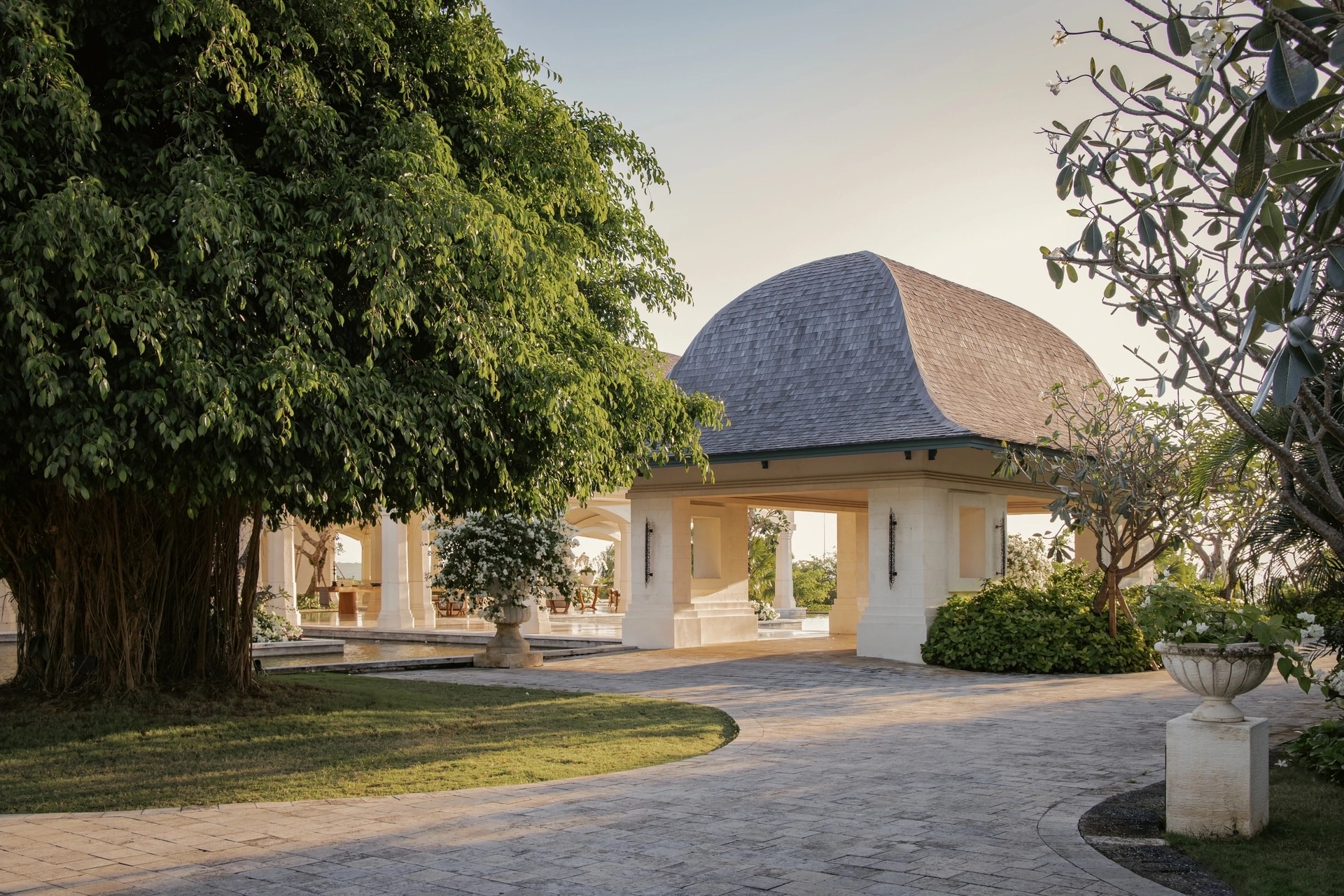 Stone water-palace courtyards and reflecting pools at Jumeirah Bali in Pecatu