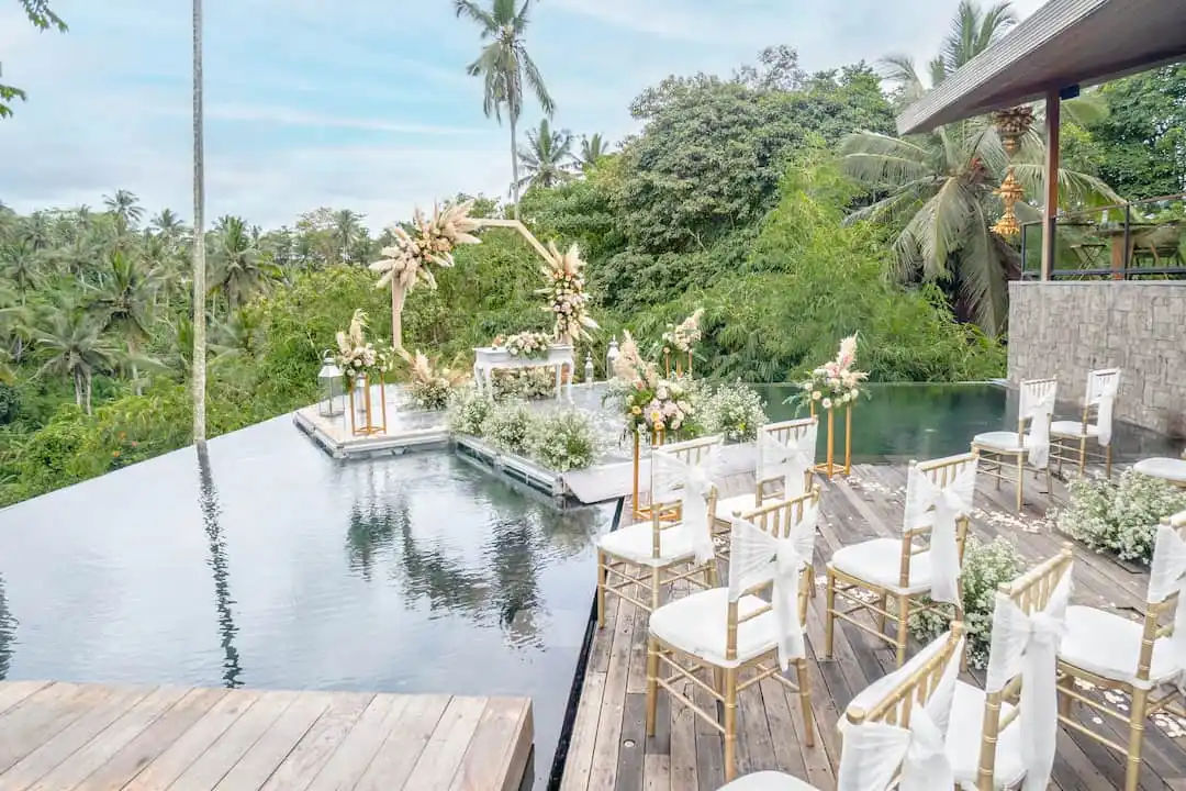 The main infinity pool at Kaamala Resort Ubud looking out over the rice fields and forest