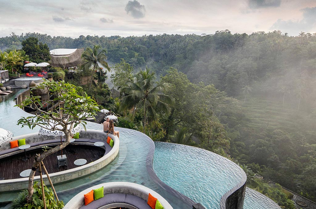 Main pool at The Kayon Jungle Resort with jungle surroundings