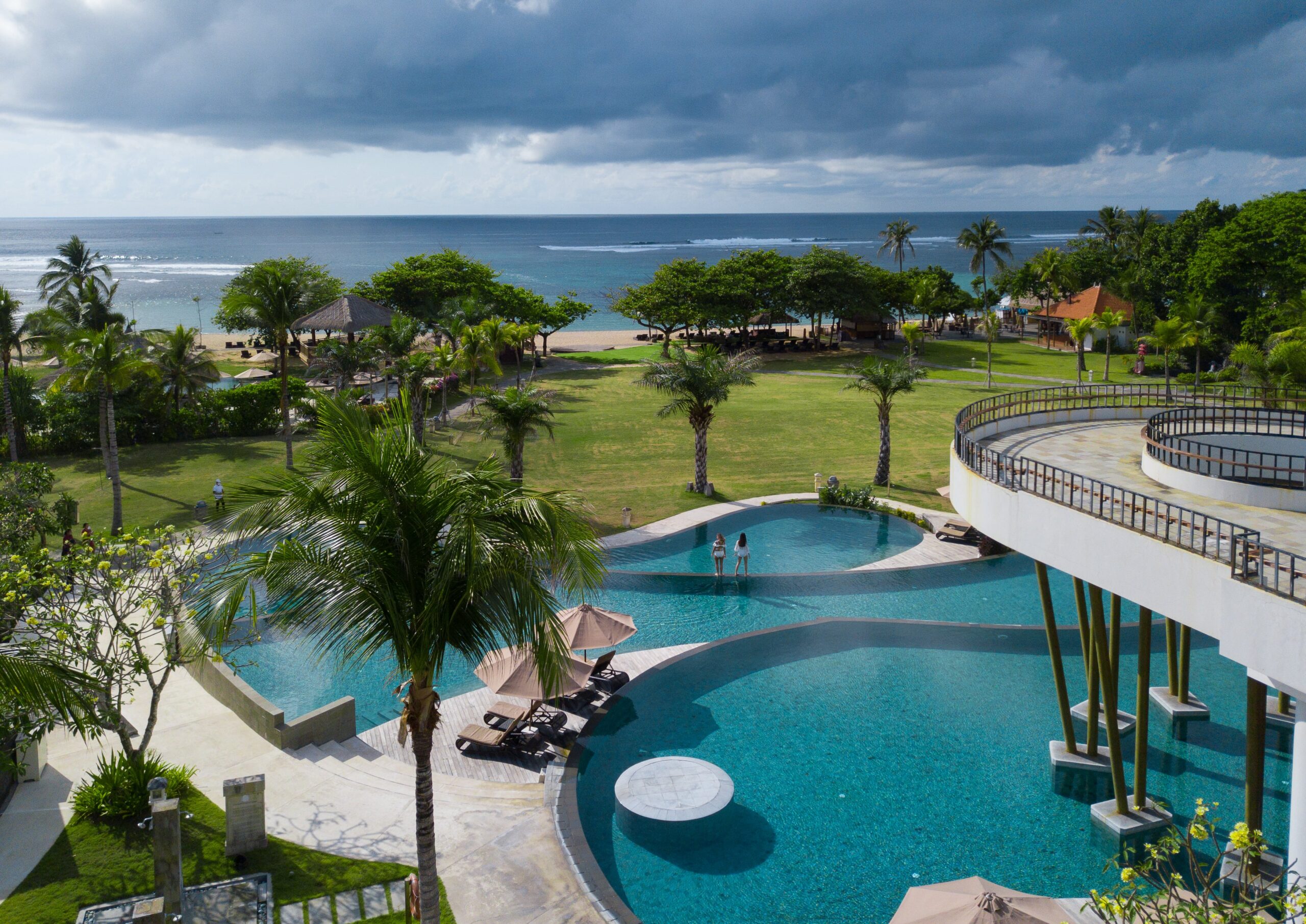 The main pool and beach view at Merusaka Nusa Dua on the Nusa Dua beachfront