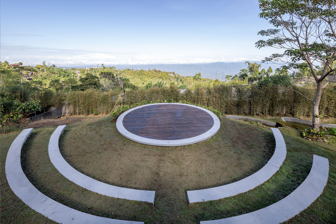 Wide view of the tiered amphitheatre and its circular stage looking out over the valley at Munduk Tentrem, Gobleg, north Bali