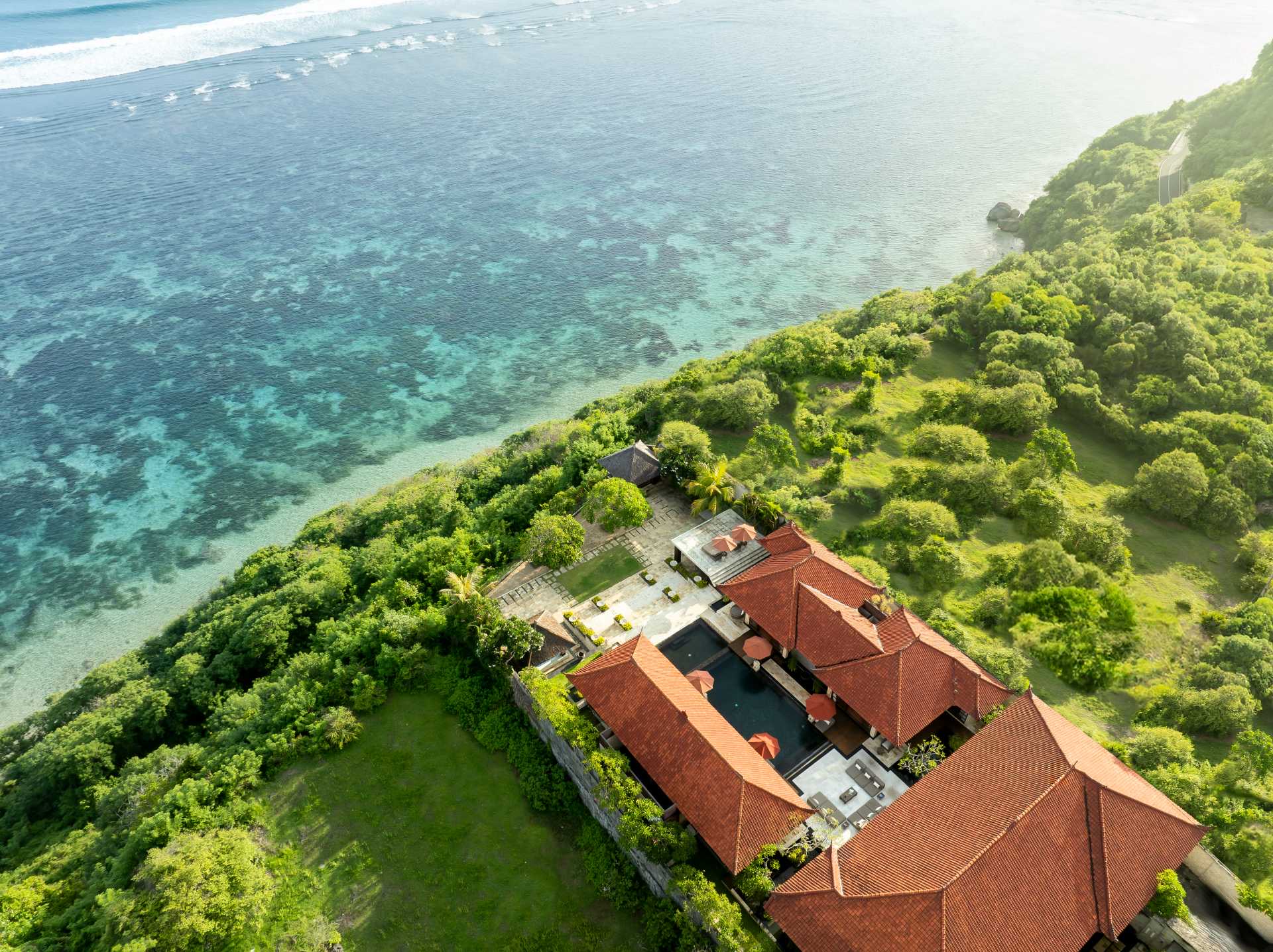 The central infinity pool at Nagasutra facing the Indian Ocean in Ungasan