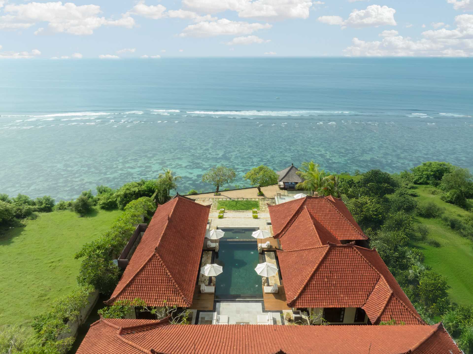 Open living and dining pavilion at Nagasutra with ocean views
