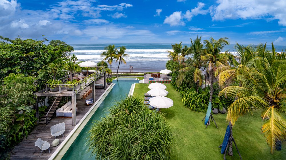 The 27 metre infinity pool at Noku Beach House running toward Seminyak Beach