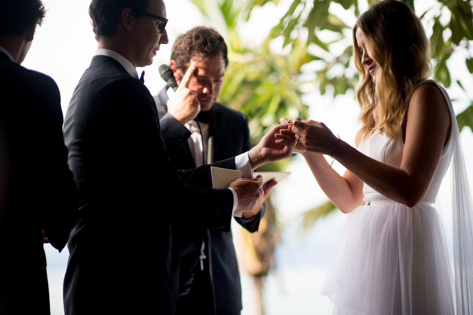 Exchange of rings at an evening celebration at Ohana's on Nusa Lembongan, Bali