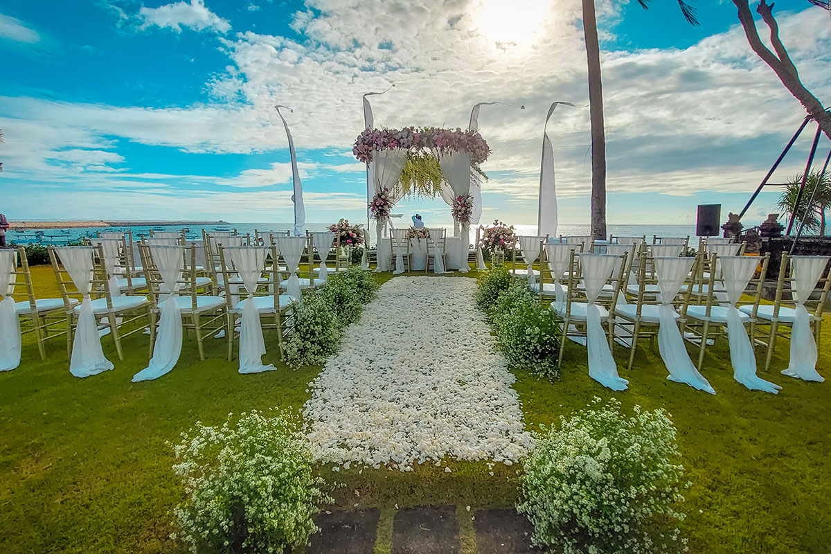 Tropical garden ceremony venue at The Patra Bali Resort & Villas