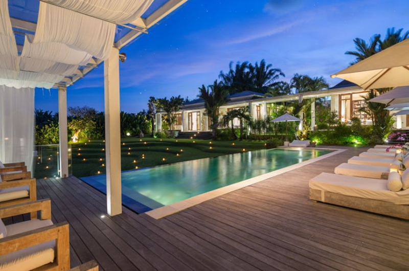 Open living pavilion at Pure Villa Bali looking onto the garden