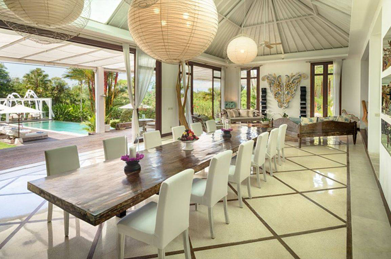 White architecture and garden lawns at Pure Villa Bali in Canggu