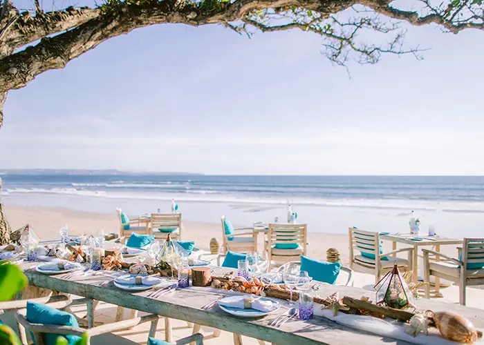 Beachfront wedding ceremony setup at The Seminyak Beach Resort & Spa on Seminyak Beach