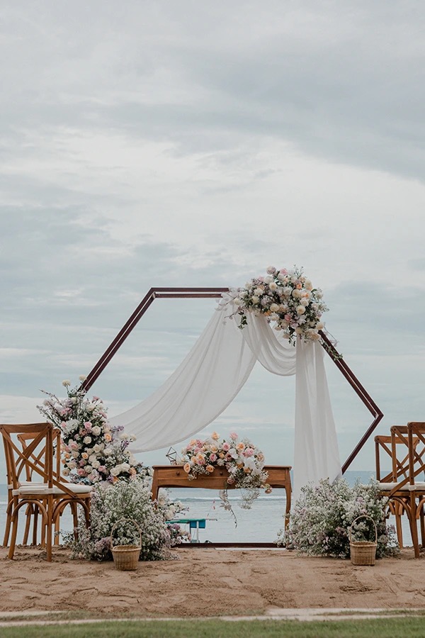 Beach wedding setting at Sadara Boutique Beach Resort on Tanjung Benoa, Bali