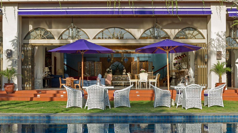 Poolside dining set beside the 20 metre pool at Sayang d'Amour