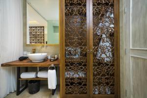 Pool and beach access area at Segara Village Hotel, Sanur coast