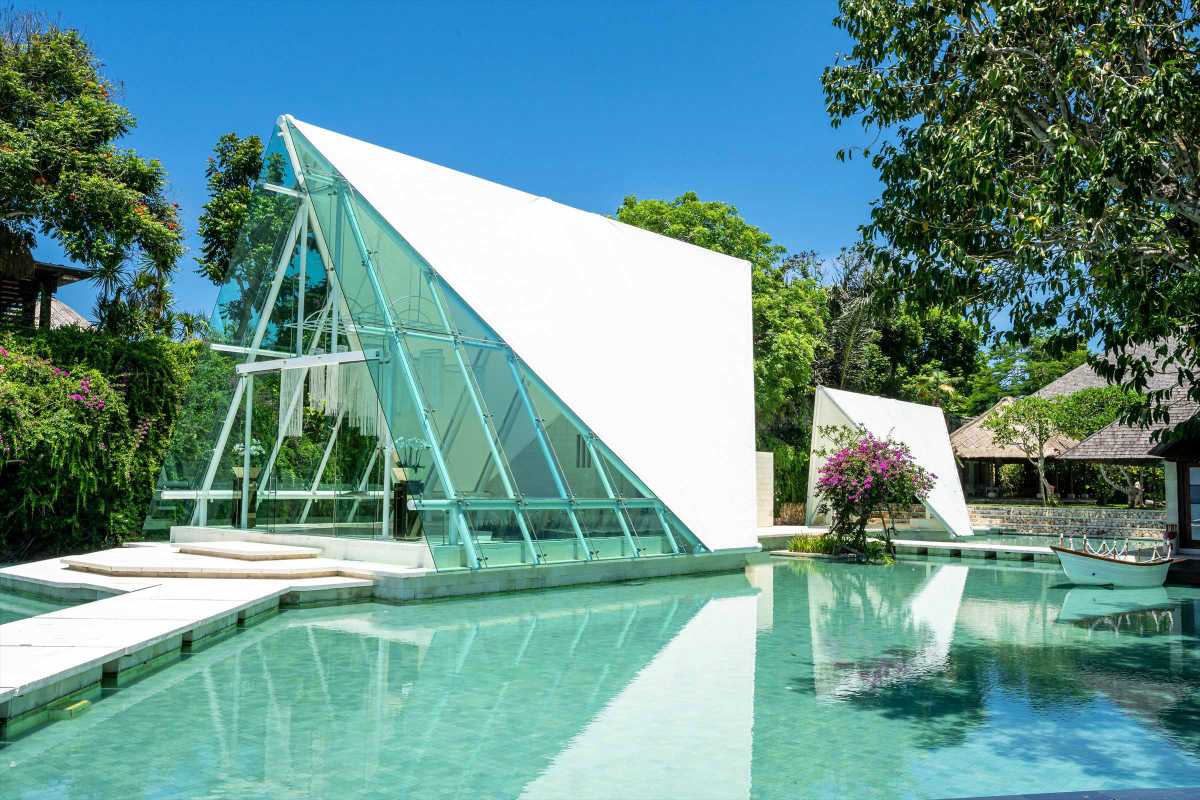 The Tirtha Uluwatu glass chapel beside the reflecting pool, ground level