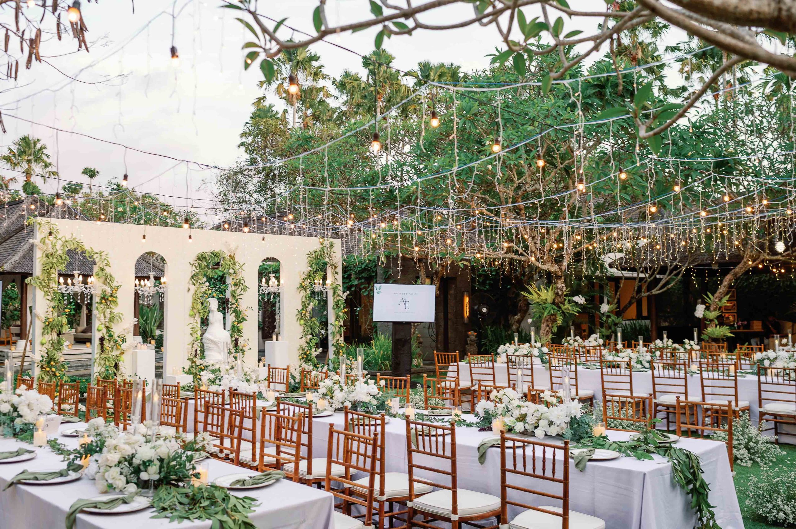 Reception table setting in the gardens at Villa Air Bali Boutique Resort & Spa