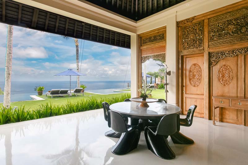 Open pavilion and garden at Villa Ambar overlooking the Indian Ocean
