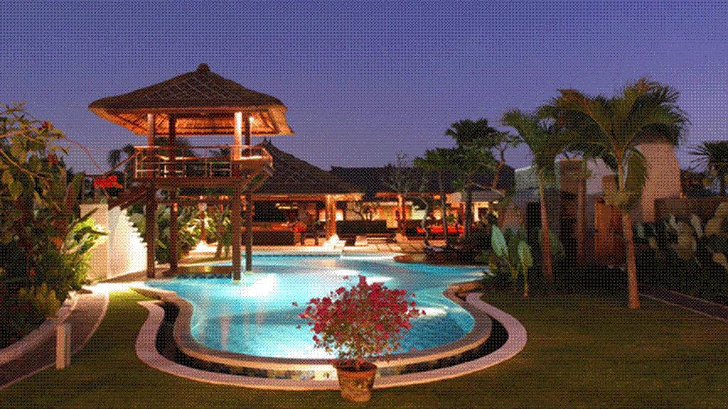 Villa Asta pool and elevated gazebo lit up at night