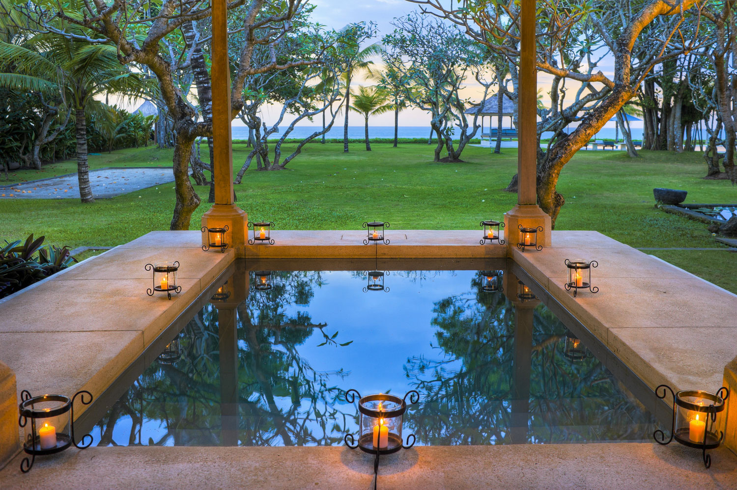 The pool at Villa Atas Ombak set among frangipani and palm gardens