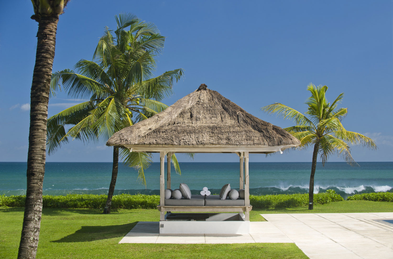 The pool bale at Villa Atas Ombak, a shaded pavilion beside the plunge pool