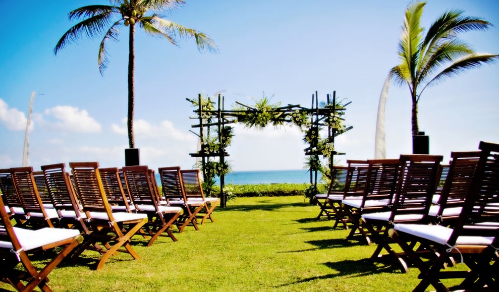 A wedding reception set up in the gardens of Villa Atas Ombak