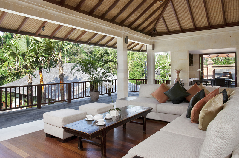 Open living pavilion at Villa Iskandar overlooking the pool and river gorge