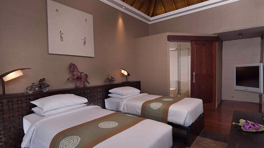 One of the four ocean-view bedrooms at Villa Karang Kembar Tiga