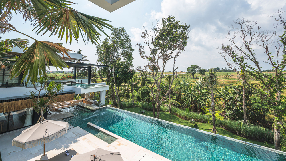 Rice-field view from a guest bedroom at Villa Nica