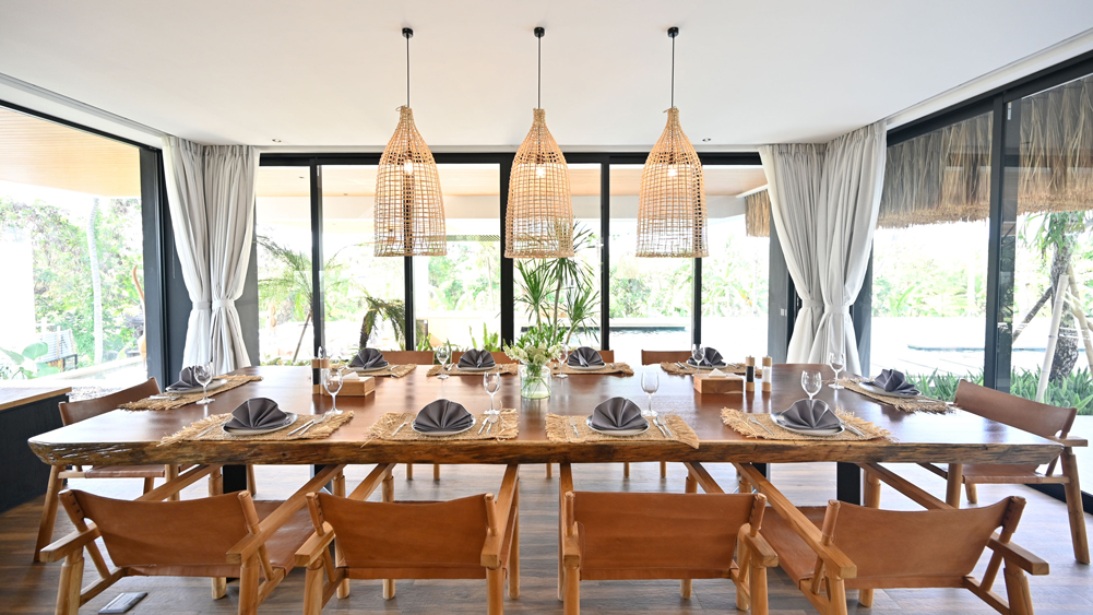 Dining set out by the pool deck at Villa Nica, Canggu