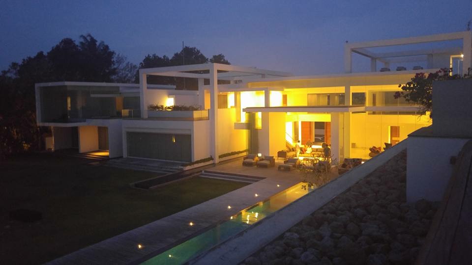 Ocean-facing lawn at Villa Ombak Biru set for a large beachfront event on Batu Belig Beach