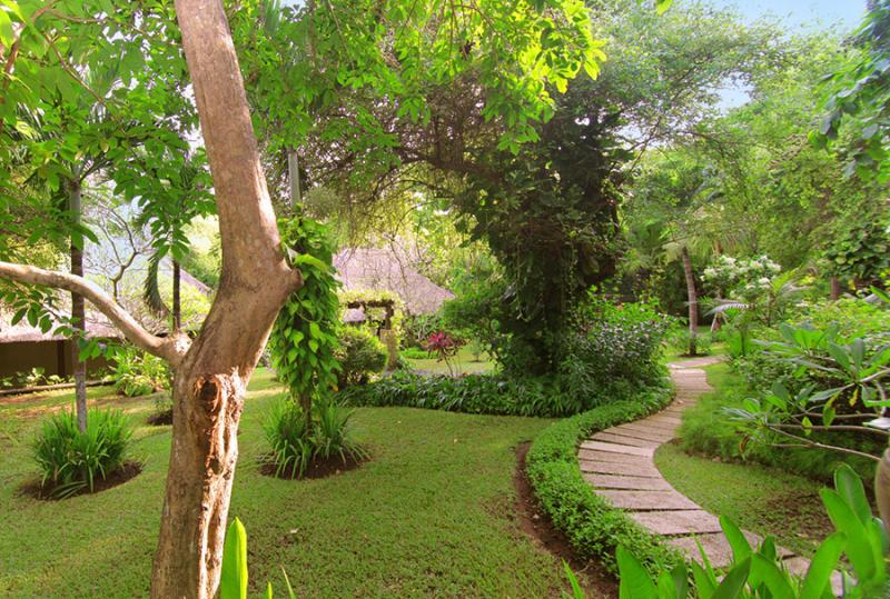Ocean-view gardens and pool terrace at Villa Pemutih on the Bukit Peninsula