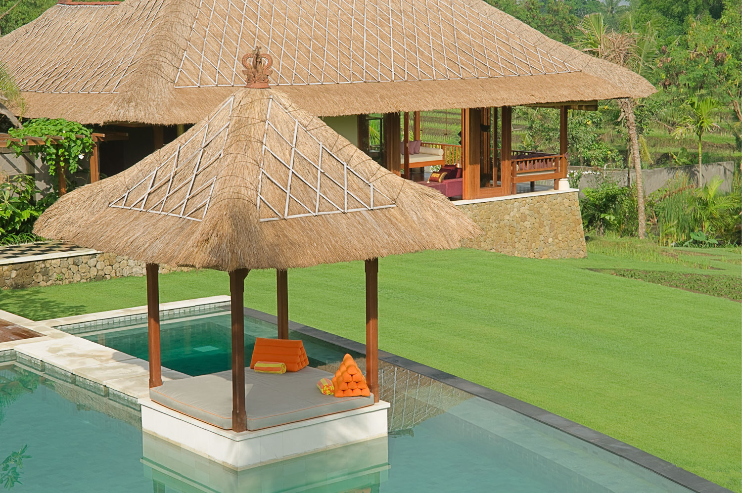 The pool bale and swimming pool at Villa Puri Bawana, framed by the terraced garden