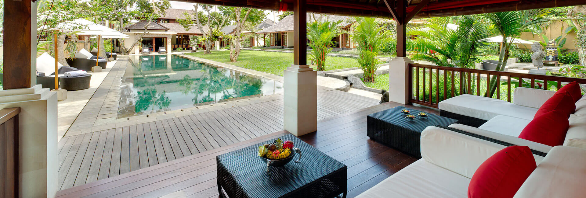 Open-sided bale pavilion at Villa San overlooking the garden and pool