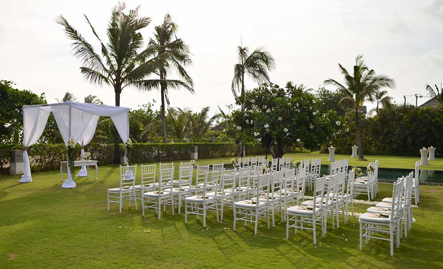 Wedding lawn set up at Villa Shalimar with rows of seating facing the ceremony arch