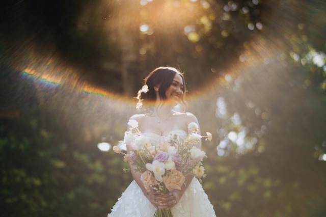 Bride holding a wedding bouquet at Wonderland Uluwatu in the Uluwatu region of Bali